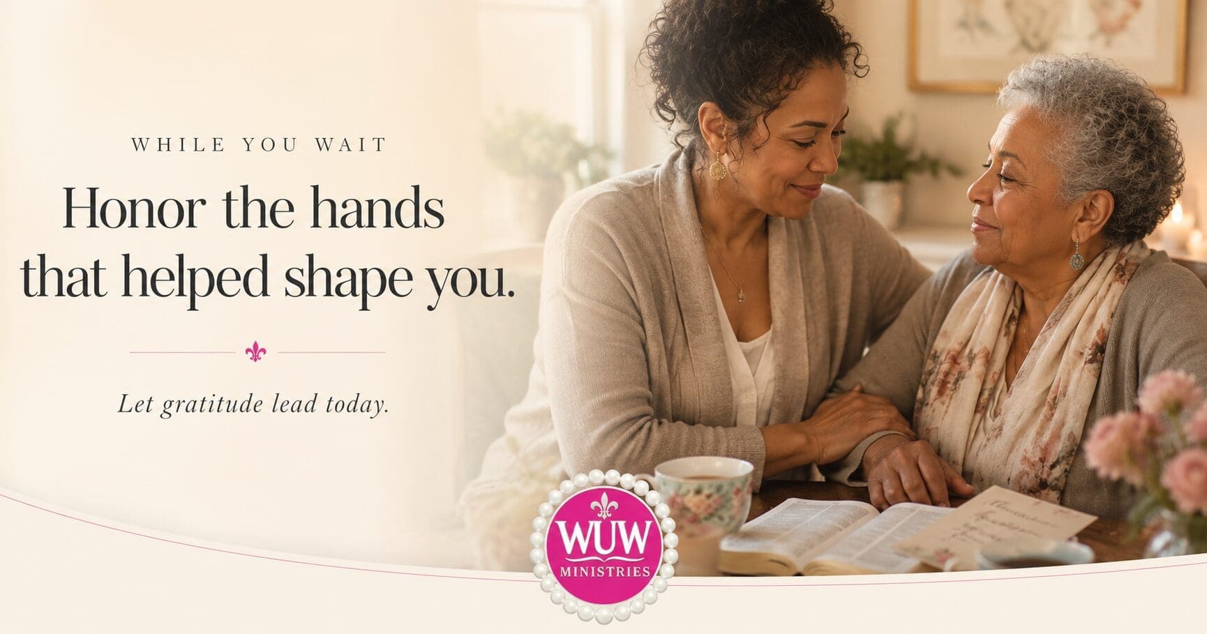 Two women sitting together in soft natural light sharing a quiet moment of gratitude and connection