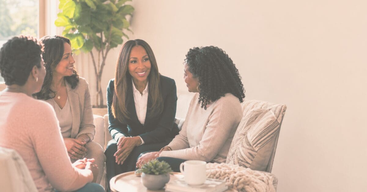 Two women sitting close in honest conversation, for the Prayer & Perspective devotional "Doubt Doesn't Disqualify You"