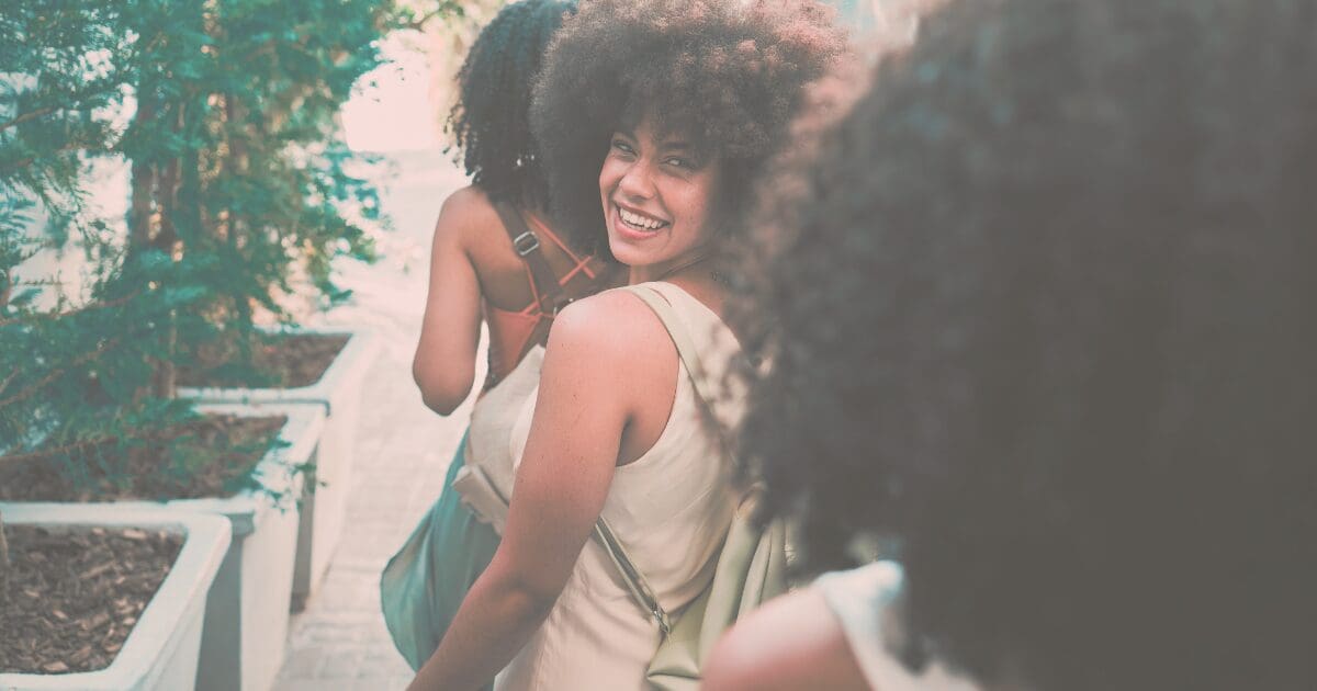 A woman walking forward with quiet confidence, for the Prayer & Perspective devotional "Wisdom Becomes a Way of Life"